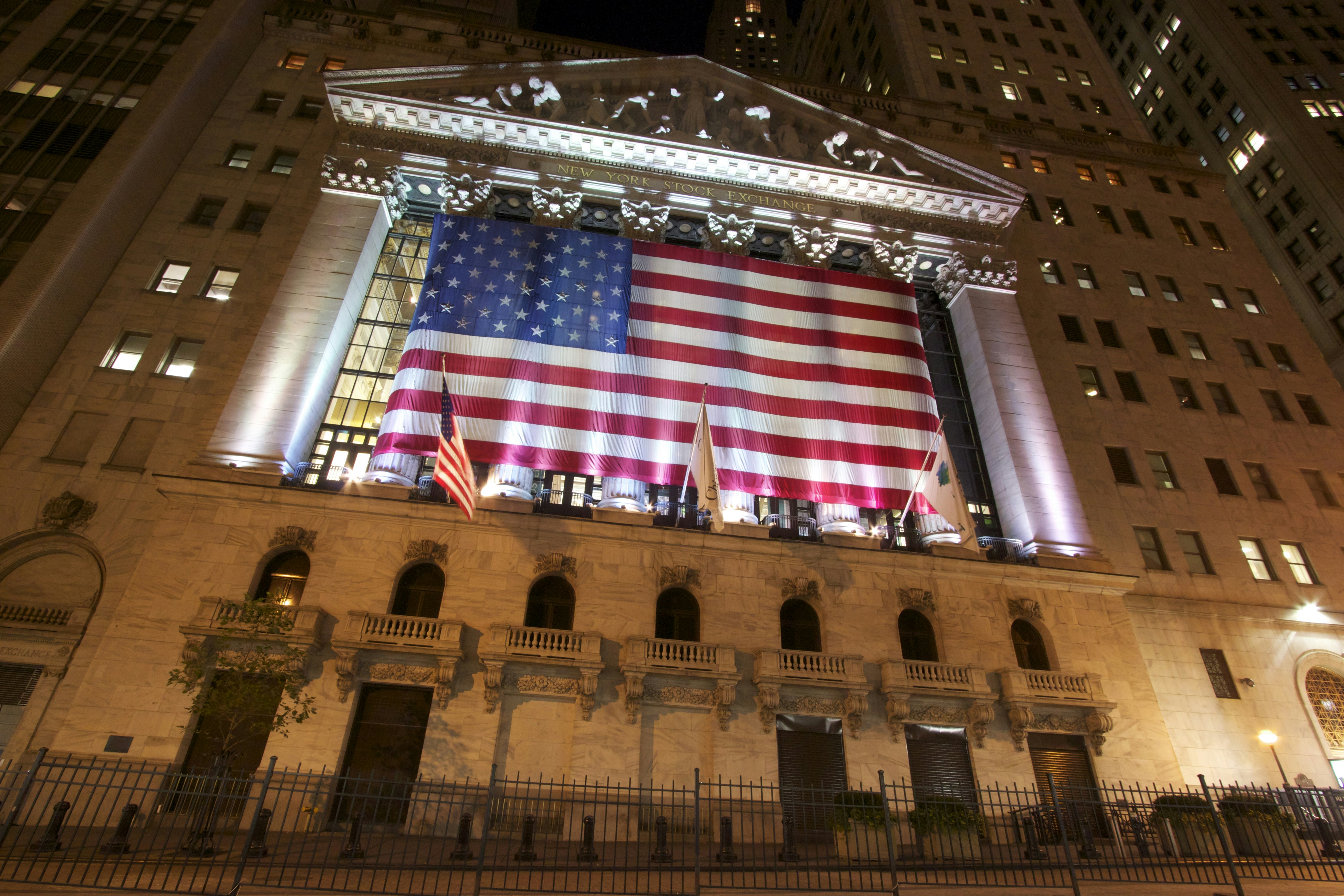 a large flag from the ceiling of a building